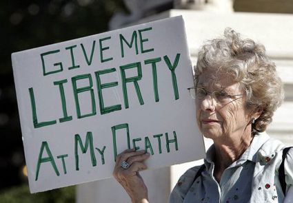 A woman protesting in favor of assisted suicide.