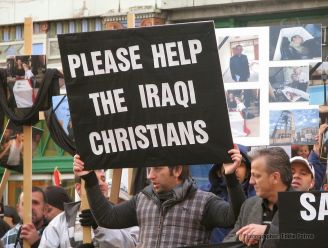 A man bringing attention to persecution of Christians in Iraq.
