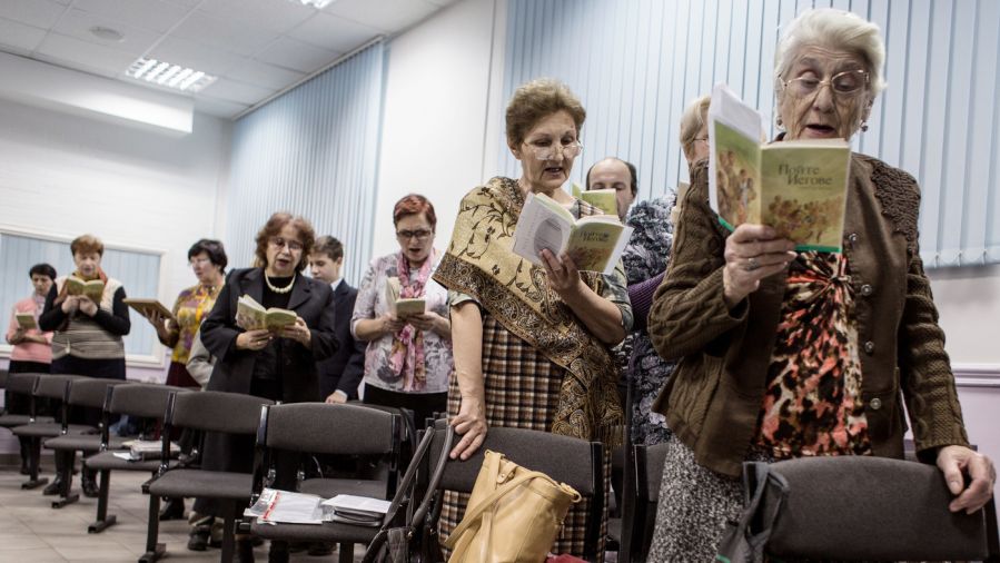 Jehovah's Witnesses sing during a service in Russia.