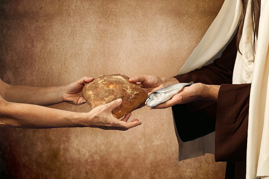 Jesus giving the gift of bread and fish