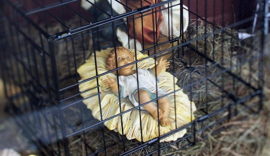 Baby Jesus in a cage