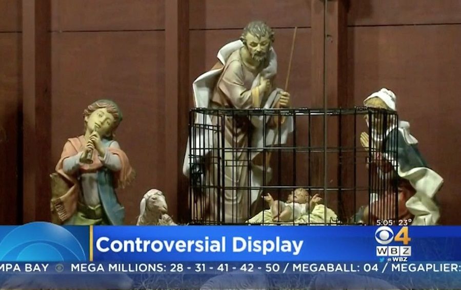 Jesus in a nativity cage