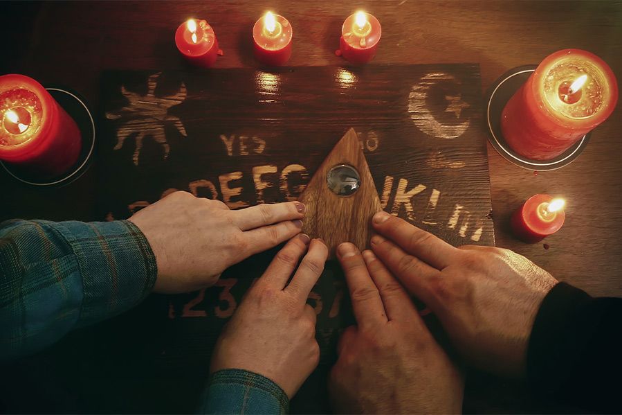 Hands on Ouija board