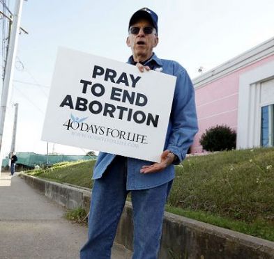 Pray to end abortion sign