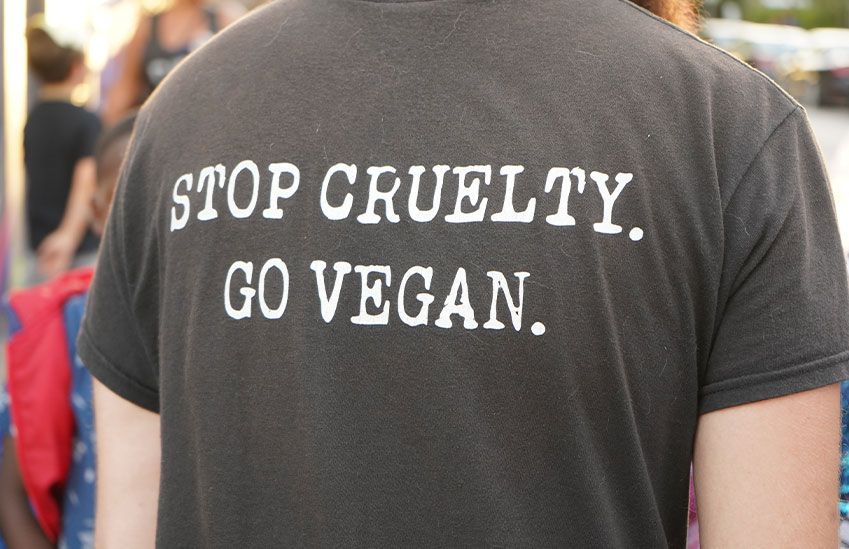 A protester wearing a vegan shirt