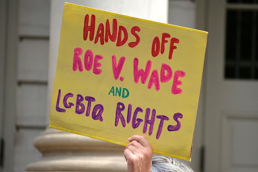 hands off roe v wade and lgbta rights protest sign