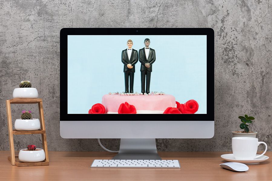 computer depicting wedding website for lgbt couple