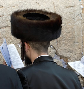 Jewish rabbis in traditional garb
