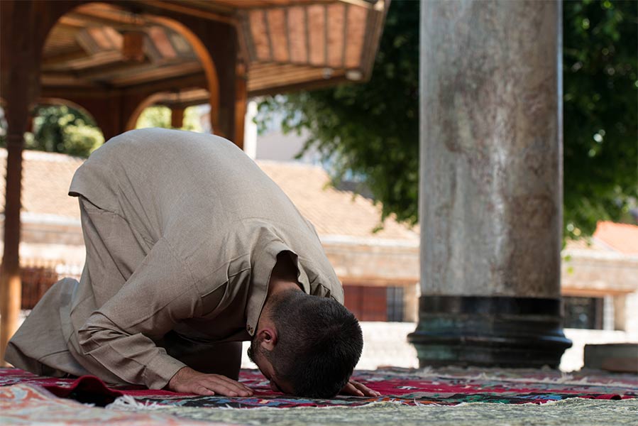 A Muslim man praying during Jummah on Friday