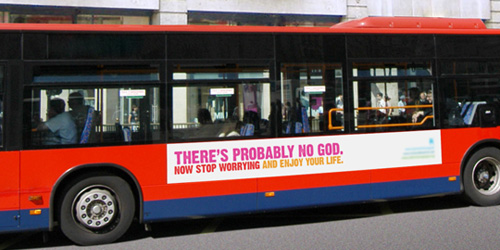 city bus with sign saying 'there's probably no god'