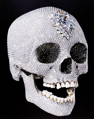 human skull adorned with diamonds