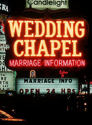 Nevada Wedding Chapel sign lit up in neon lights