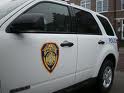 police van with police shield on driver's side door