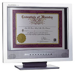 Universal Life Church ministry credential on computer monitor