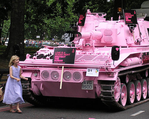 Pink tank next to little girl
