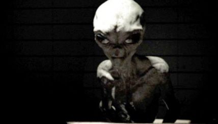 An alien being interviewed in a short film which warns about the dangers of religious dogma.
