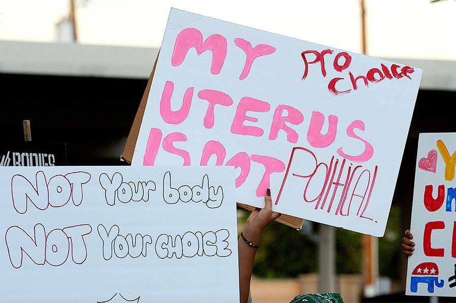 signs at pro abortion rally in arizona