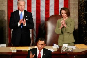 Joe Biden and Nancy Pelosi clapping at President Obama's state of the union address
