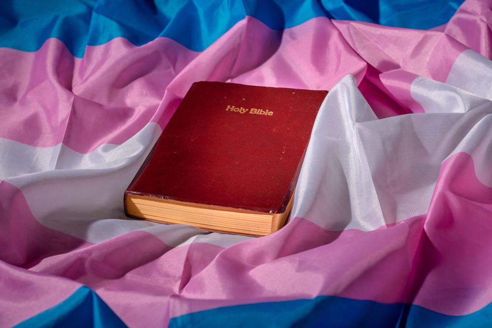 The Bible on a trans flag