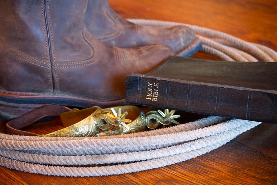 The bible next to cowboy boots