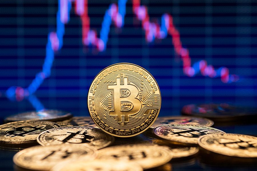 depiction of bitcoin in front of line graph showing crypto market