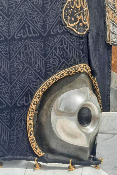 The Black Stone sits encased in a shining metal holder where it is affixed onto the Eastern wall of the Kabba.