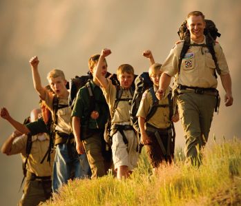 A troop of Boy Scouts hiking.