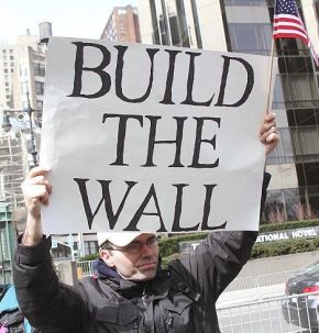 Sign urging a border wall in U.S.