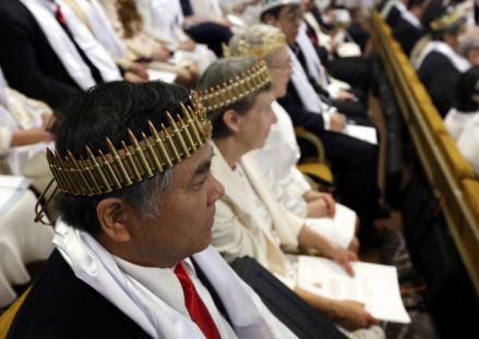 Worshippers wearing bullet crowns