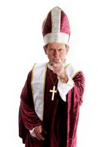 man dressed as nun holding rosary beads