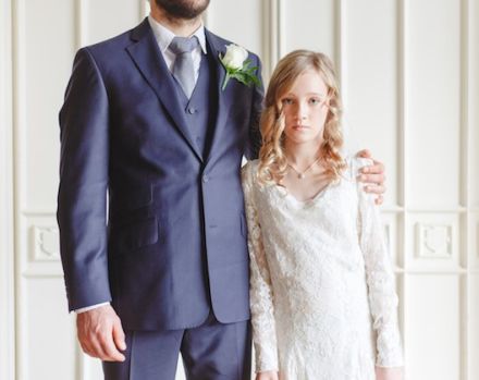 A child bride looking scared