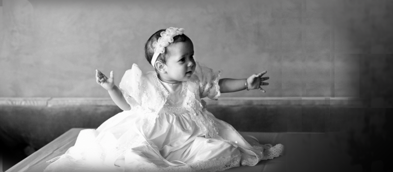 A baby at a christening ceremony