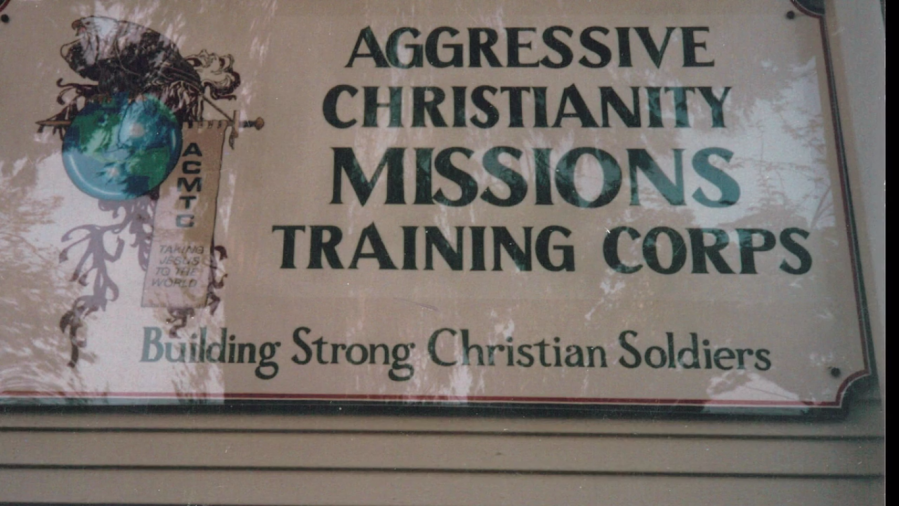 A plaque recruiting members to a paramilitary Christian cult