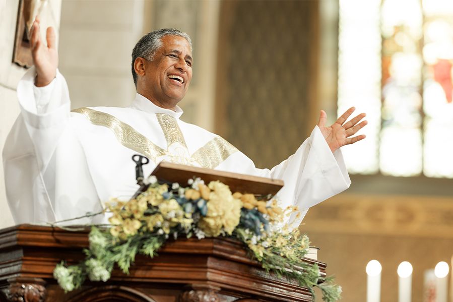 pastor delivering sermon in front of church congregation