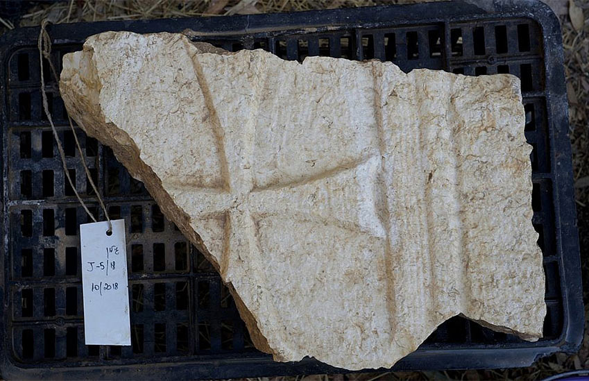 A piece of a cross found at the site of the Church of the Apostles