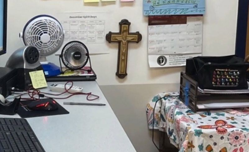 crucifix hanging in classroom