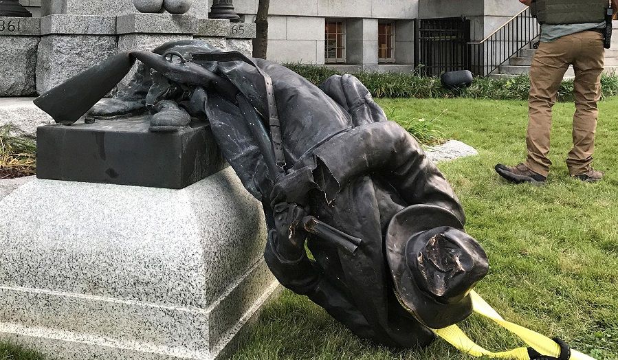 A Confederate statue being torn down
