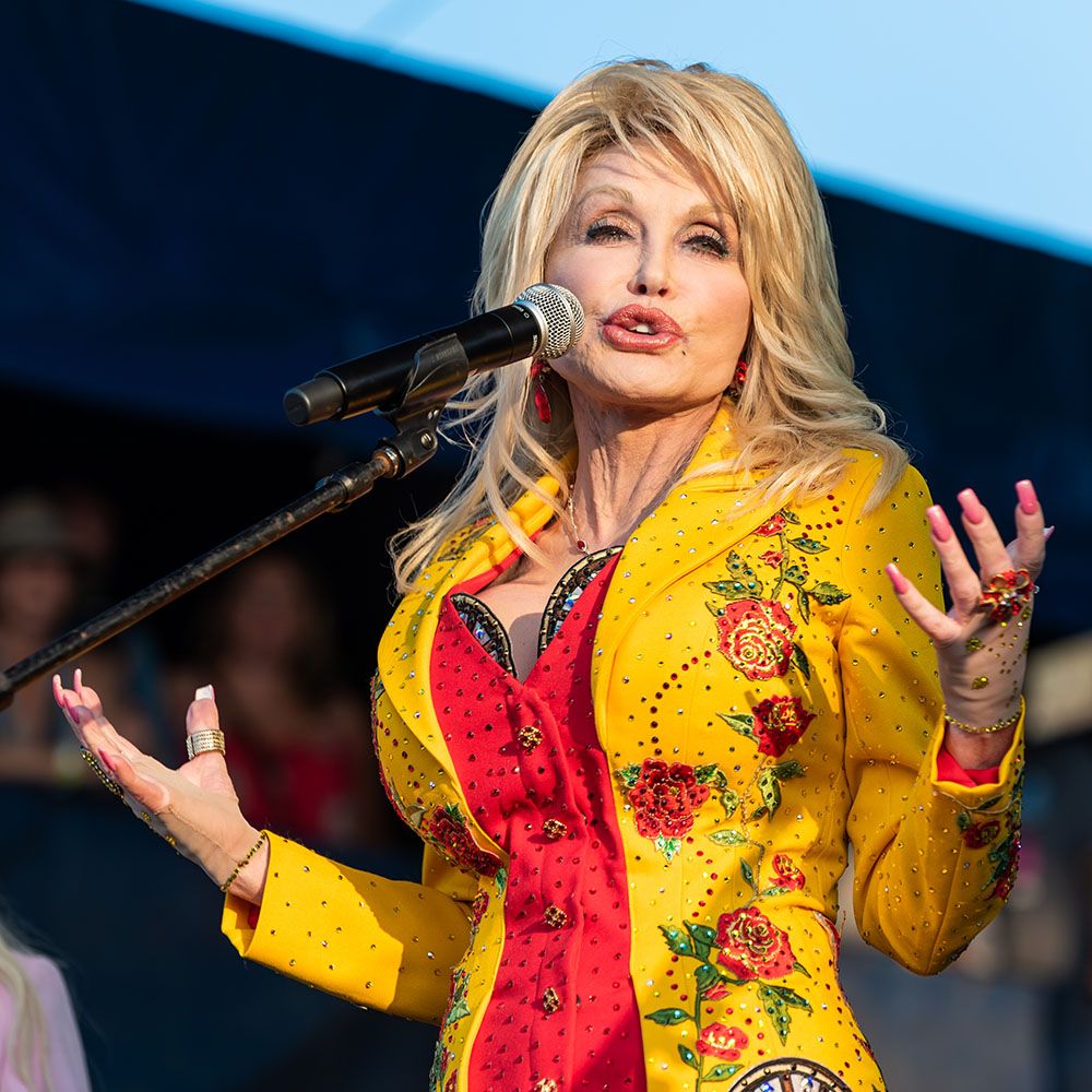Dolly Parton reads to a group of children at a Library of Congress event