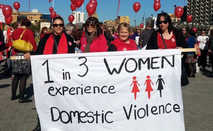 Women raising awareness for domestic violence, an issue which has been glossed over by religious leaders.