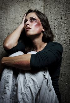 A woman who has suffered domestic violence.