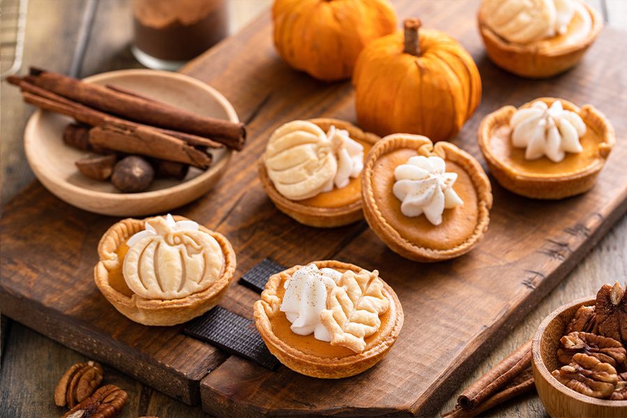 spread of fall desserts at autumn wedding