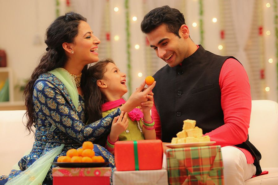 family celebrating Diwali at home