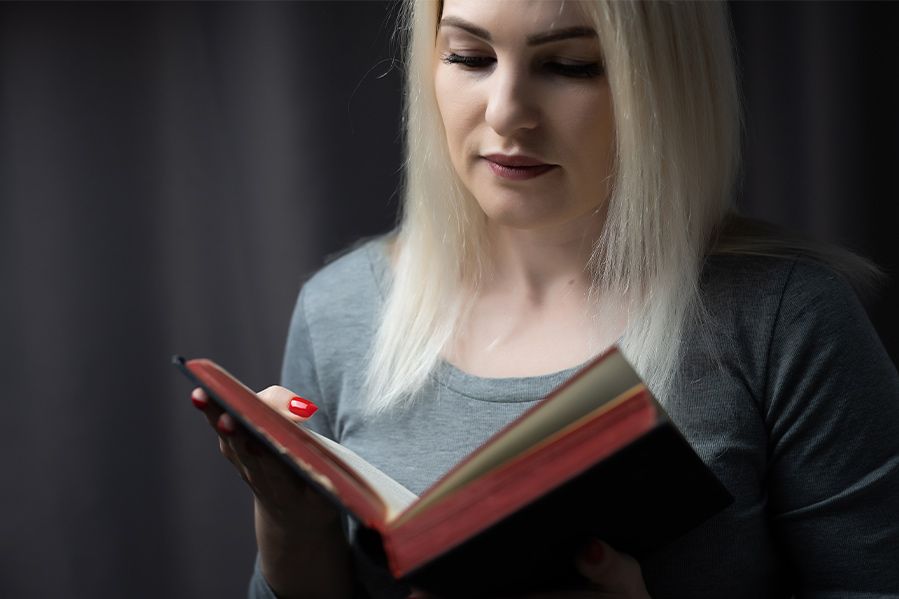 woman minister reading bible