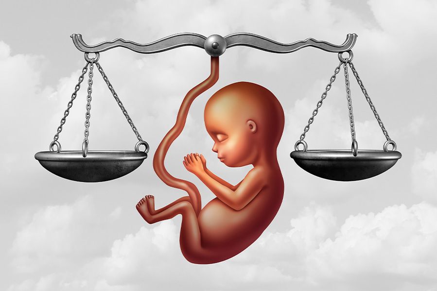 fetus and scales of justice, depiction of legal battle over abortion