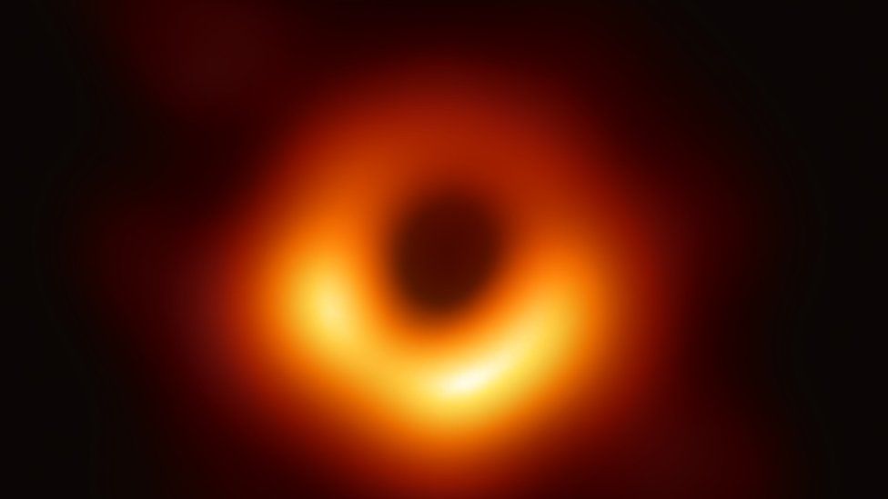 artist's rendering of a black hole