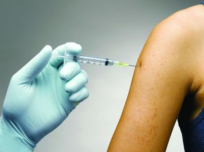 person receiving flu shot