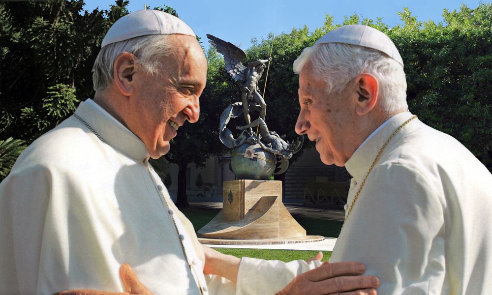 Pope Francis and retired Pope Benedict XVI stand together during a ceremony in the Vatican Gardens in 2013.