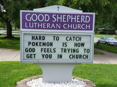 A church sign promoting the pokemon game