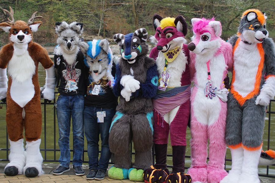 group of furries in costume at furry meetup
