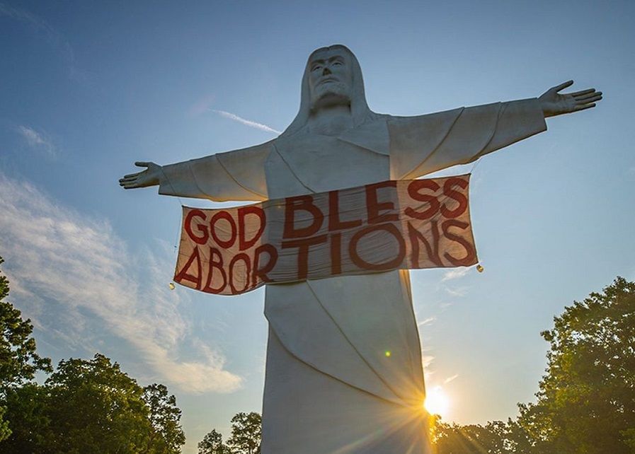 god bless abortions sign